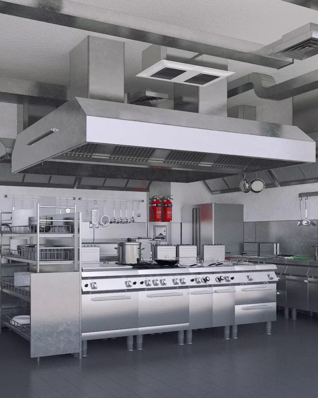 Commercial kitchen with stainless cooking line, extraction canopy and prep counters